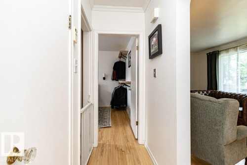 Hardwood flooring throughout the hallway - 10507 67 Avenue Nw, Edmonton, AB 
