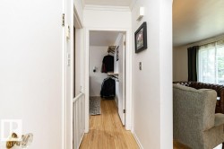 Hardwood flooring throughout the hallway - 