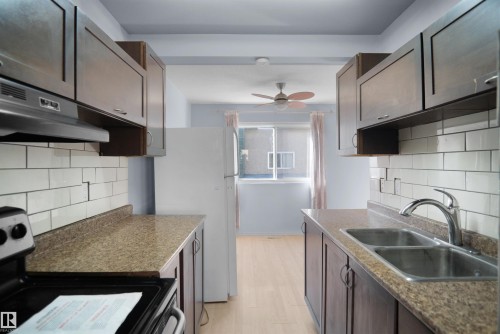 887 Abbottsfield Road Nw, Edmonton, AB - Indoor Photo Showing Kitchen With Double Sink