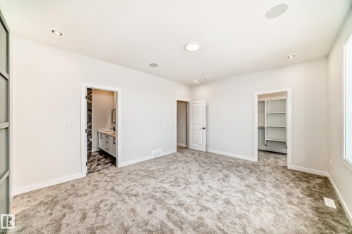Plush carpet flooring, recessed ceiling lighting, built-in ceiling speakers, and white painted doors - 47 Meadowgrove Lane, Spruce Grove, AB 