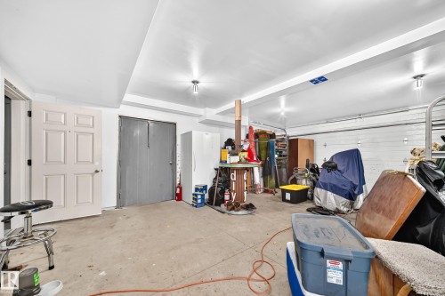 One Bay of 3 Car Detached Garage - Fire Door Between the 2 Car and ONE Car Sections. - 12045 64 Street Nw, Edmonton, AB 