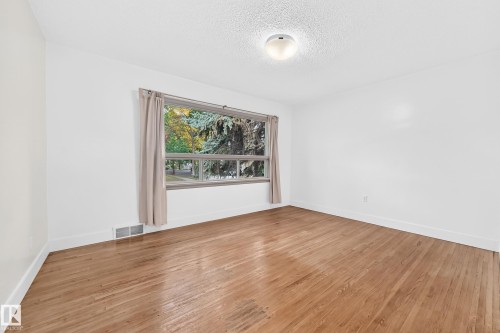 One of 2 Main Floor Bedrooms - 12045 64 Street Nw, Edmonton, AB 