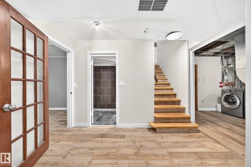 Area at bottom of Stairs from Separate Rear Entry - 12045 64 Street Nw, Edmonton, AB 