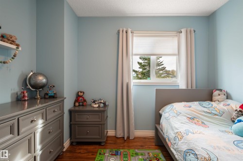 Hardwood-style flooring throughout - 38 Dubonnet Way, St. Albert, AB 