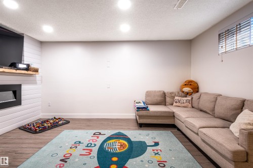 Recessed lighting, wood-finish flooring, and white walls - 38 Dubonnet Way, St. Albert, AB 