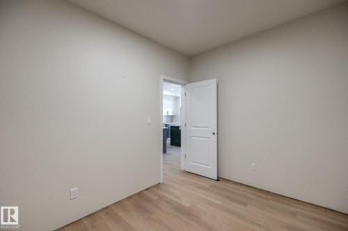 Wood-finish flooring throughout - 2358 Muckleplum Way Sw, Edmonton, AB 