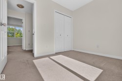 Neutral-toned carpeting throughout - 