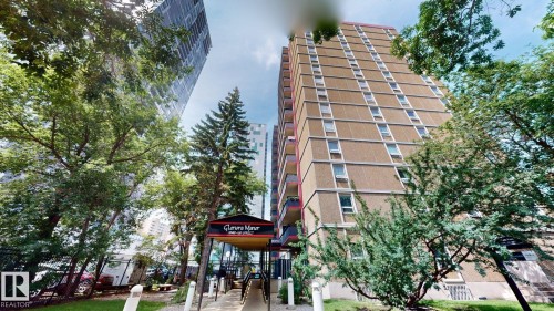 Glenora Manor high-rise building featuring a concrete facade, multiple windows, and individual balconies - #307 10140 120 Street Nw, Edmonton, AB - Outdoor