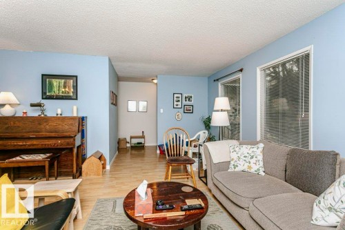 10968 35 Avenue Nw, Edmonton, AB - Indoor Photo Showing Living Room