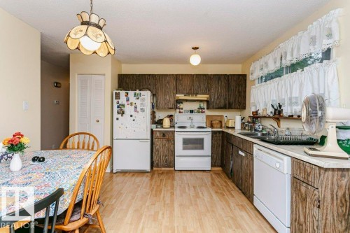 10968 35 Avenue Nw, Edmonton, AB - Indoor Photo Showing Kitchen With Double Sink