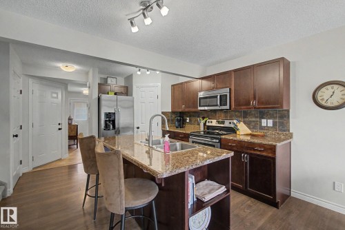 7 Peter Street, Spruce Grove, AB - Indoor Photo Showing Kitchen With Double Sink