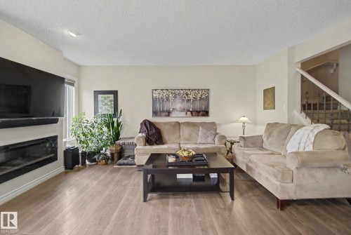 7 Peter Street, Spruce Grove, AB - Indoor Photo Showing Living Room With Fireplace