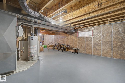 7 Peter Street, Spruce Grove, AB - Indoor Photo Showing Basement