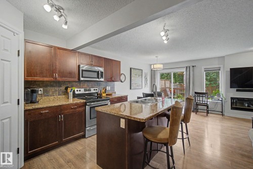 7 Peter Street, Spruce Grove, AB - Indoor Photo Showing Kitchen With Double Sink