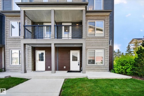 Multi-story exterior with horizontal siding and shake accents - #44 3025 151 Av Nw, Edmonton, AB 