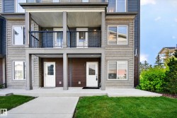 Multi-story exterior with horizontal siding and shake accents - 