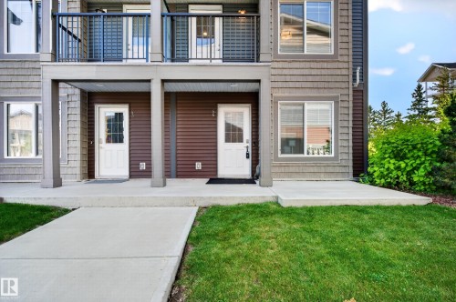 Multi-level exterior with shingle siding and contrasting horizontal siding accents - #44 3025 151 Av Nw, Edmonton, AB 
