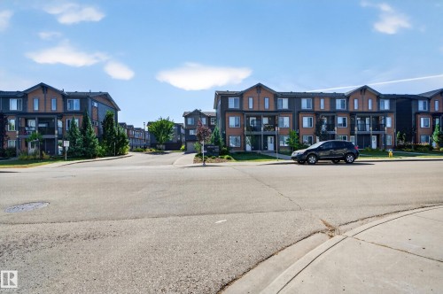 Multi-story residential buildings with brick and siding facades - #44 3025 151 Av Nw, Edmonton, AB 