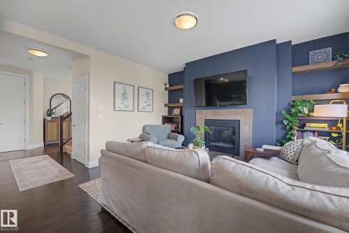 2004 South Creek Drive, Stony Plain, AB - Indoor Photo Showing Living Room With Fireplace