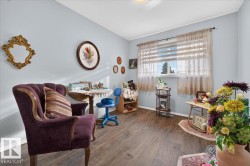 Wood-finish flooring with light blue wall paint - 