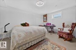 White painted walls with recessed lighting and a window - 