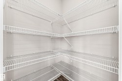 Spacious wire shelving system with multiple tiers providing ample storage capacity - 