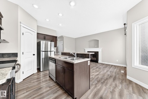 Kitchen island with dual basin sink and integrated dishwasher - Edmonton, AB 
