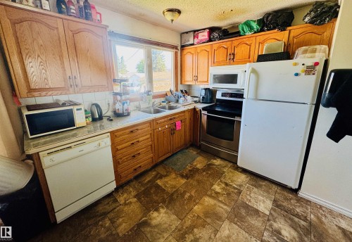 4210 48 Avenue, St. Paul Town, AB - Indoor Photo Showing Kitchen With Double Sink