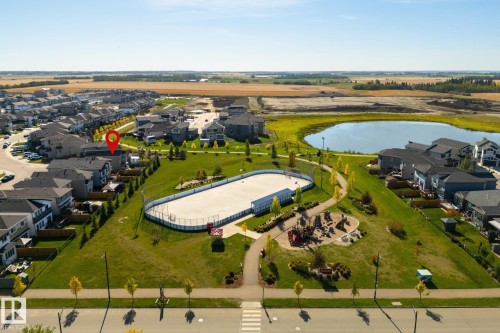 Residential property with a lake, public park, sports court, and children's playground - 1032 Berg Place, Leduc, AB 