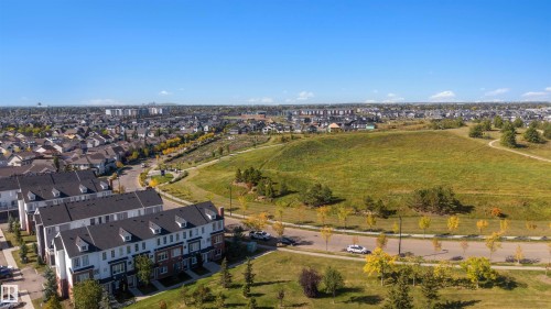 Townhome community with extensive green space, mature trees, and paved walking paths - #1 1636 Kerr Rd Nw, Edmonton, AB 