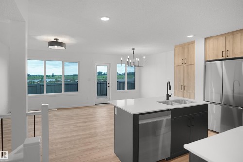 #21 1430 Aster Wy Nw, Edmonton, AB - Indoor Photo Showing Kitchen With Double Sink