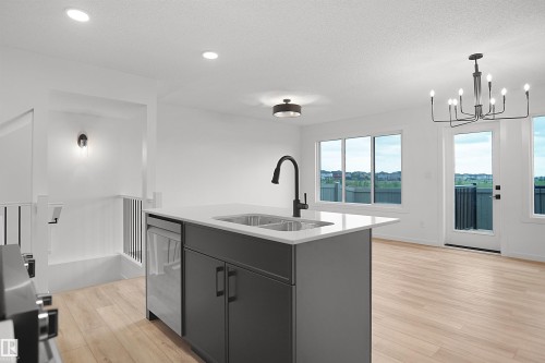 #21 1430 Aster Wy Nw, Edmonton, AB - Indoor Photo Showing Kitchen With Double Sink
