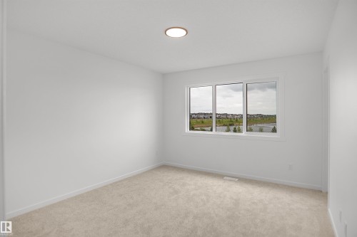 #21 1430 Aster Wy Nw, Edmonton, AB - Indoor Photo Showing Other Room