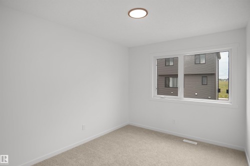 #21 1430 Aster Wy Nw, Edmonton, AB - Indoor Photo Showing Other Room