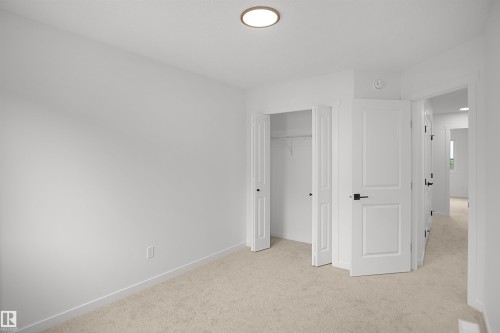 #21 1430 Aster Wy Nw, Edmonton, AB - Indoor Photo Showing Other Room