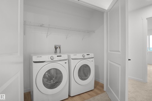 #21 1430 Aster Wy Nw, Edmonton, AB - Indoor Photo Showing Laundry Room