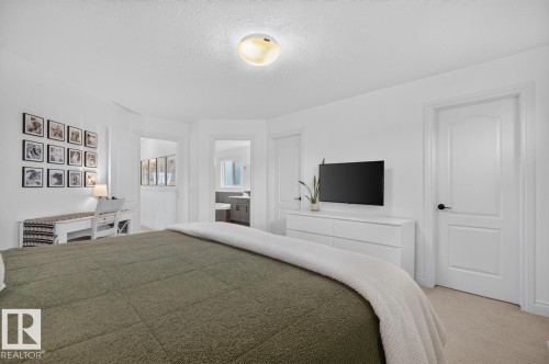 White interior walls with a flush-mount ceiling light - 21 Altadena Point(E), Sherwood Park, AB 