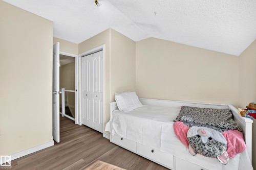 Wood-finish flooring with neutral wall tones - 161 Lancaster Terrace Nw, Edmonton, AB 