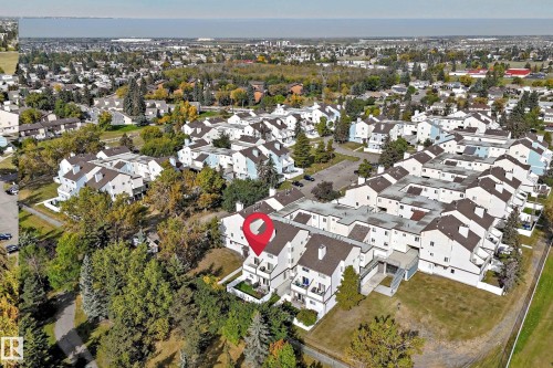 Aerial perspective of a multi-unit property within a residential community - 161 Lancaster Terrace Nw, Edmonton, AB 