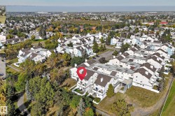 Aerial perspective of a multi-unit property within a residential community - 
