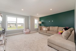 Recessed ceiling lighting, multiple large windows, and wall-to-wall carpeting - 