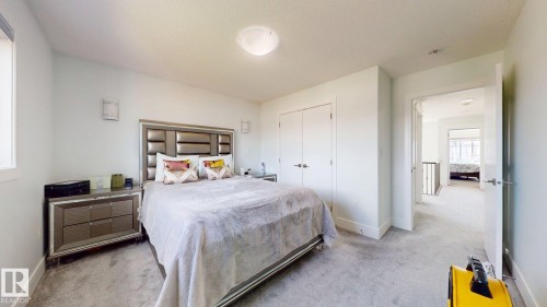 Recessed lighting, light gray carpeting, and white walls - 1103 30 Street Nw, Edmonton, AB 