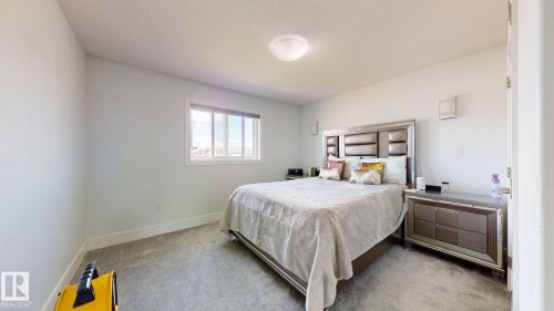 Clean white walls with a single window - 1103 30 Street Nw, Edmonton, AB 