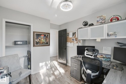 Recessed closet with shelving and hanging rod - 38 Menalta Place, Cardiff, AB 