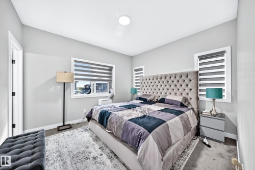 Recessed ceiling lighting, white window trim, and light gray wall paint - 2415 194 Street Nw, Edmonton, AB 