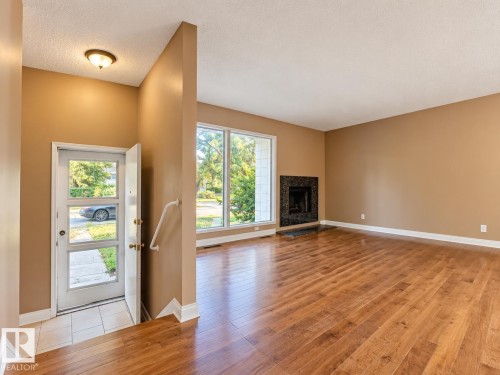 Hardwood flooring throughout the main living area - 12204 40 Avenue Nw, Edmonton, AB 