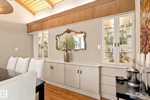 Vaulted ceiling with wood paneling and exposed beams - 13862 Ravine Drive Nw, Edmonton, AB 