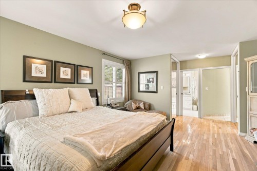 Hardwood-style flooring throughout - 13862 Ravine Drive Nw, Edmonton, AB 