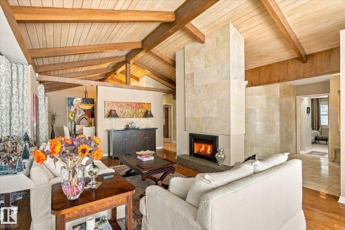 Vaulted wood-paneled ceiling with exposed beams - 13862 Ravine Drive Nw, Edmonton, AB 