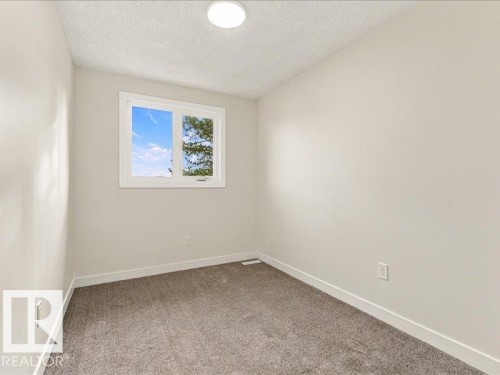 Recessed ceiling light, neutral wall paint, white window trim, gray carpet flooring, white trim - 18325 66 Avenue Nw, Edmonton, AB 
